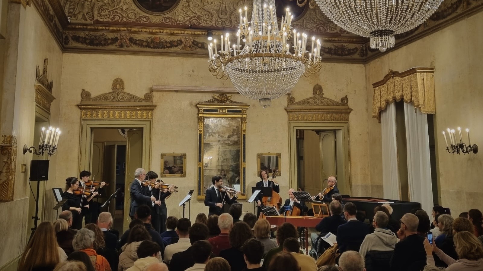 An orchestra performing in the Ridotto del Teatro Comunale in Ferrara